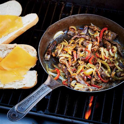grilled-philly-cheesesteaks-recipe-tom-mylan-food image
