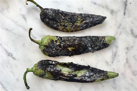 roasted-and-peeled-chile-peppers-recipe-the-spruce-eats image