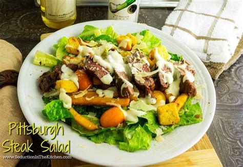 pittsburgh-steak-salad-fries-and-ranch-dressing-on-a image