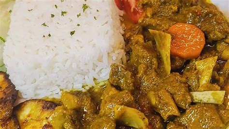 best-jamaican-curry-goat-recipe-jamaican-life-travel image