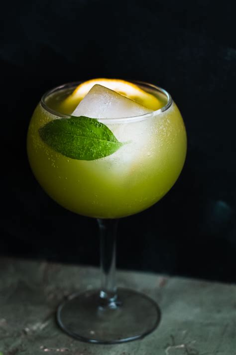 sparkling-basil-lemon-mocktail-meg-is-well-beverages image