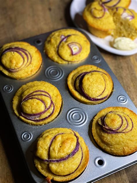red-onion-sage-corn-muffins-two-a-knife image