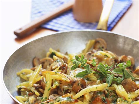 sauted-potatoes-with-mushrooms-and-cheese image