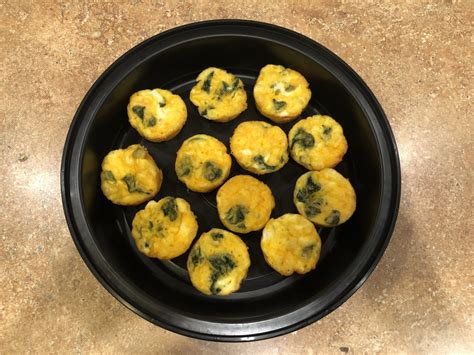 spinach-and-cheese-egg-mini-muffins-delishably image