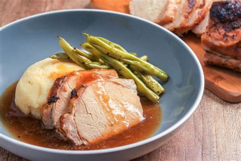 savory-crock-pot-pork-loin-roast-recipe-the-spruce image
