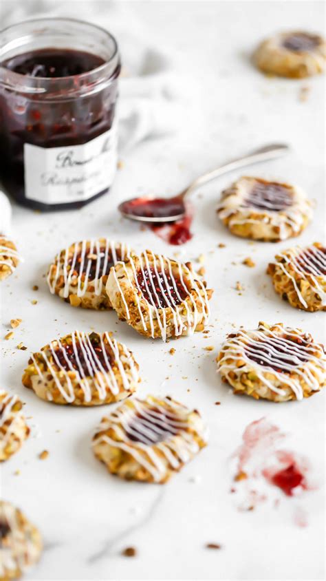 pistachio-and-raspberry-thumbprint-cookies image