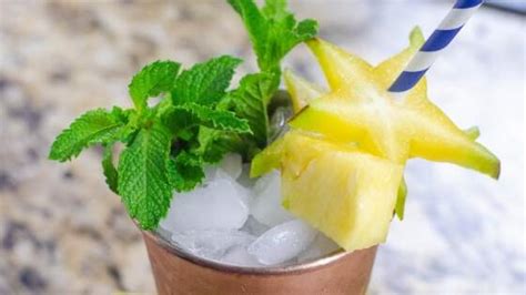 starfruit-pineapple-mint-julep-recipe-champagne-and image
