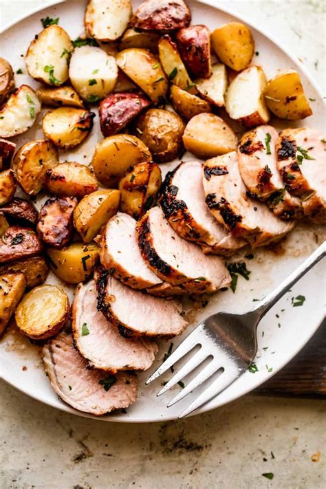 roast-pork-tenderloin-with-potatoes-easy image