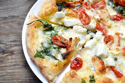 spinach-pizza-with-sun-dried-tomatoes-by-archanas-kitchen image