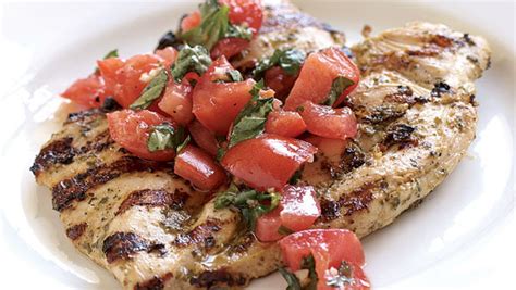 grilled-chicken-with-pesto-marinated-tomatoes image