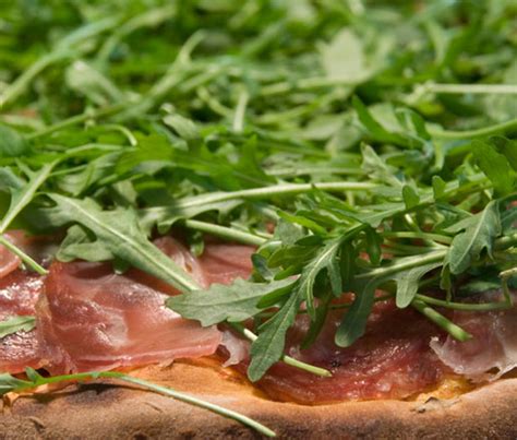 pizza-with-prosciutto-and-arugula-james-beard-foundation image