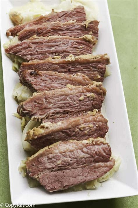 baked-corned-beef-with-mustard-and-brown-sugar-copykat image