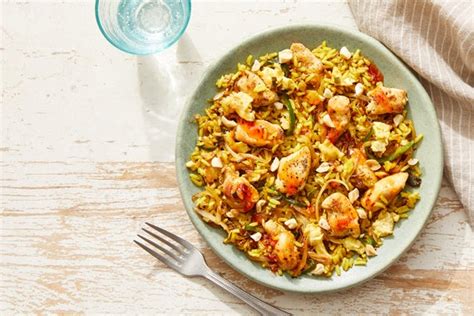 curry-spiced-chicken-fried-rice-with-sweet-chili-sauce image