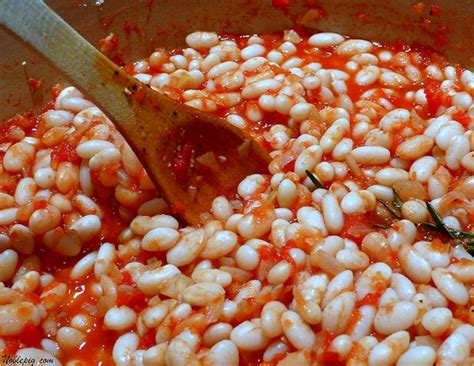 stewed-white-beans-with-tomatoes-and-rosemary image