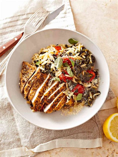 greek-oregano-chicken-with-spinach-orzo-and-grape-tomatoes image