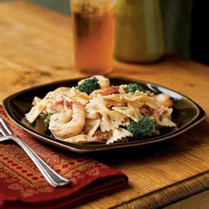 shrimp-broccoli-sun-dried-tomatoes-with-pasta image