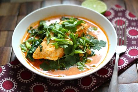 poached-halibut-in-thai-coconut-curry-broth-alaska image