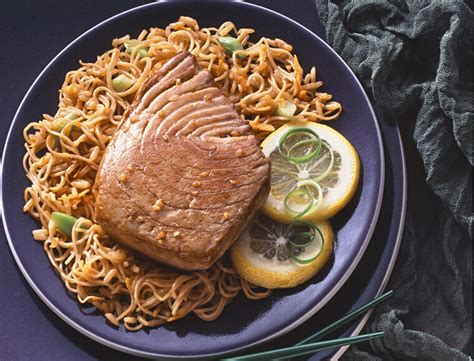 teriyaki-tuna-steaks-with-fried-rice-noodles-land image