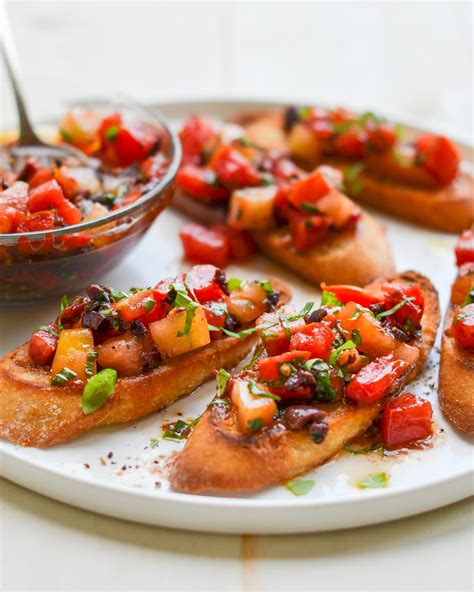 bruschetta-with-heirloom-tomatoes-olives-and-basil image