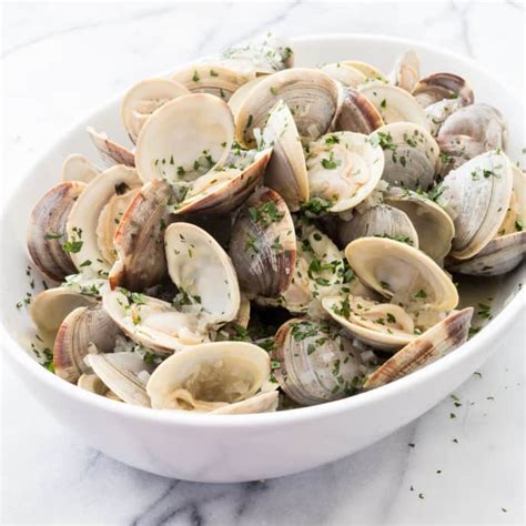 clams-steamed-in-white-wine-cooks-illustrated image