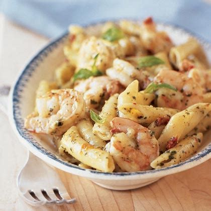 shrimp-and-pasta-with-creamy-pesto-sauce-myrecipes image