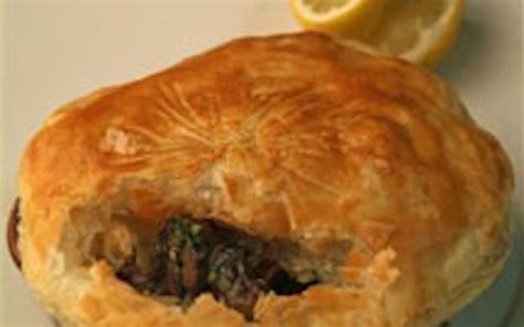 classic-escargots-in-puff-pastry-with-parsley-lemon image