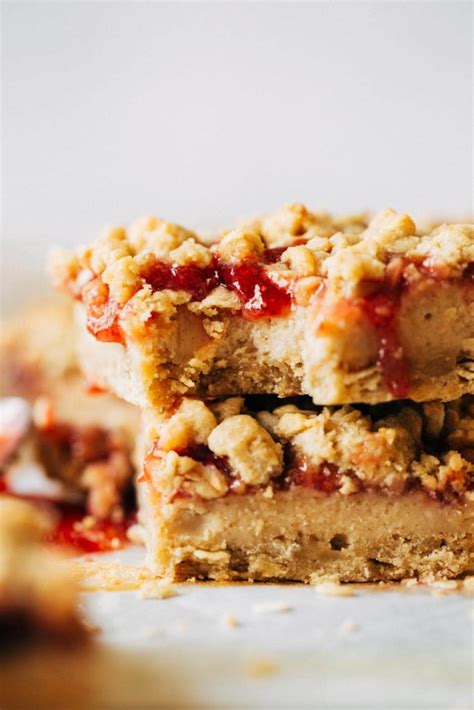 peanut-butter-and-jelly-cheescake-bars-butternut-bakery image