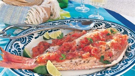 grilled-whole-fish-with-roasted-tomato-chile-sauce image