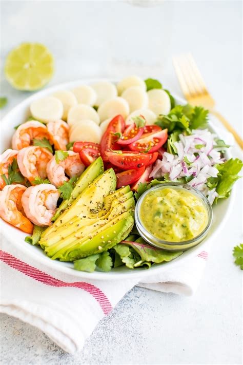 hearts-of-palm-salad-with-shrimp-and-avocado-eating image