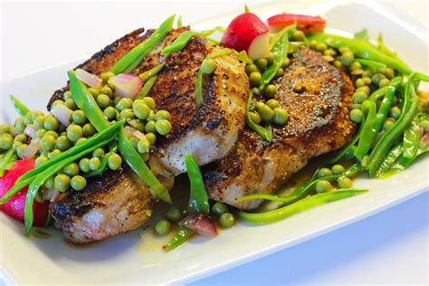 pan-seared-pork-chops-with-spring-vegetables image