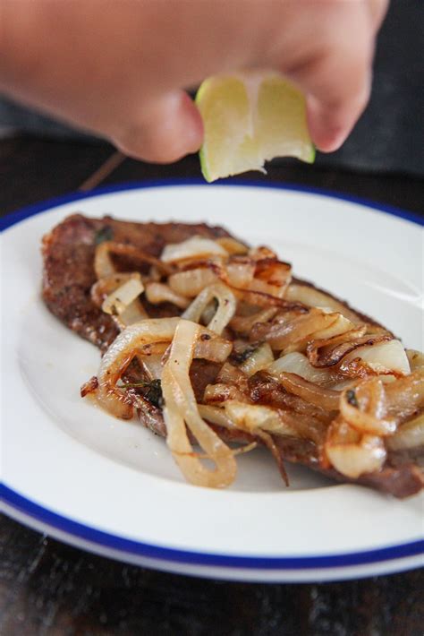 bistec-encebollado-cuban-steak-and-onions-cooked-by image