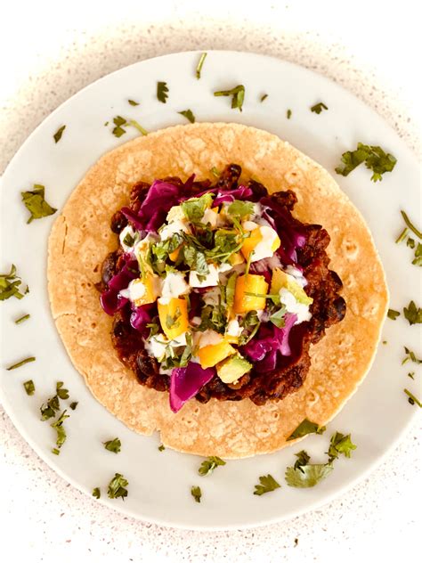 black-bean-tacos-with-cabbage-slaw-and-lime-crema image