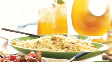 couscous-with-golden-raisins-pine-nuts-and-green image