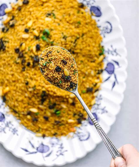 moroccan-couscous-with-currants-and-pine-nuts-posh image