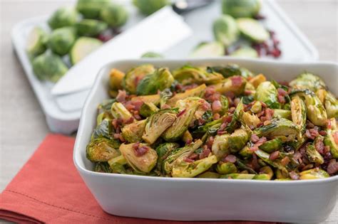 caramelized-brussels-sprouts-with-dried-cranberries-and-bacon image