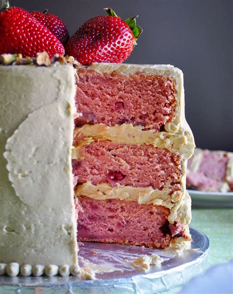 fresh-strawberry-cake-with-pistachio-buttercream image