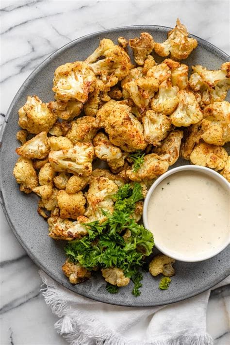 oven-roasted-cauliflower-with-tahini-feelgoodfoodie image