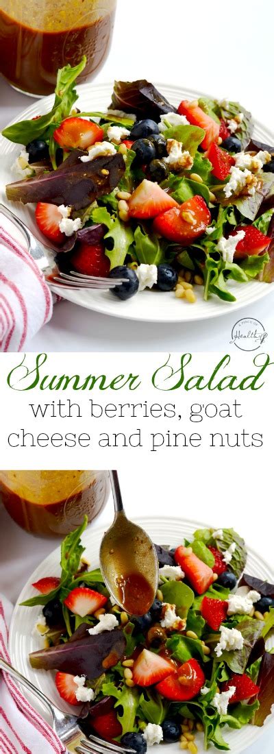 summer-salad-with-berries-goat-cheese-and-pine-nuts image