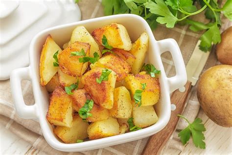 oven-roasted-potatoes-with-parsley-recipe-the-spruce image