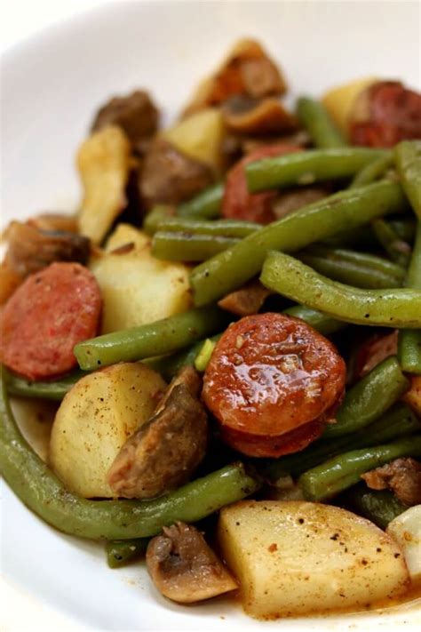 slow-cooker-cajun-sausage-potatoes-and-green-beans image