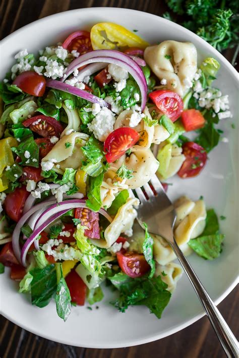 greek-tortellini-salad-with-tomatoes-and-feta-peas-and image