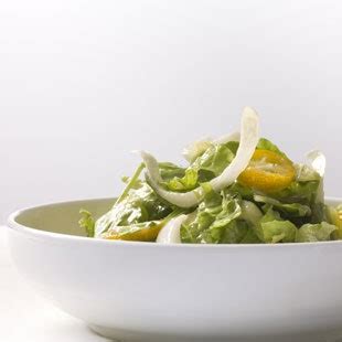 mixed-bitter-greens-and-kumquat-salad-with-anchovy image