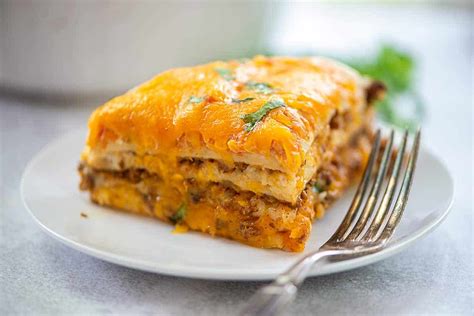 easy-layered-burrito-pie-recipe-buns-in-my-oven image