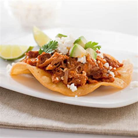 spicy-mexican-shredded-pork-tostadas-tinga image
