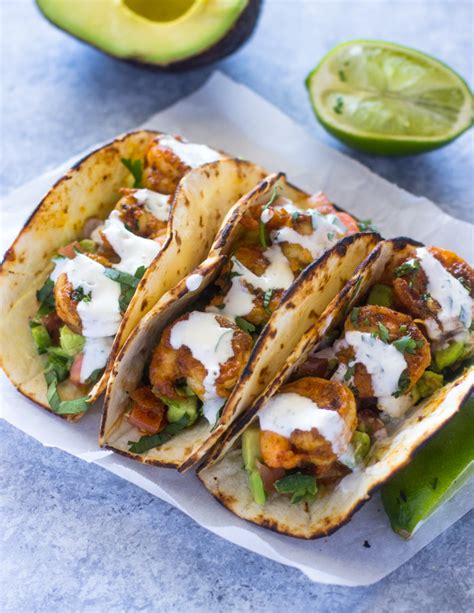 spicy-shrimp-tacos-with-avocado-salsa-sour-cream image