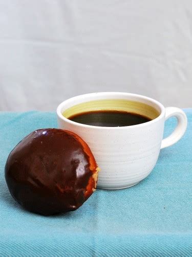 chocolate-glazed-peanut-butter-stuffed-donuts image
