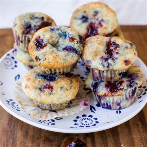 blueberry-muffins-with-raspberry-jam-swirls-averie image