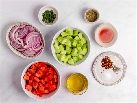 marinated-cucumber-tomato-and-onion-salad image