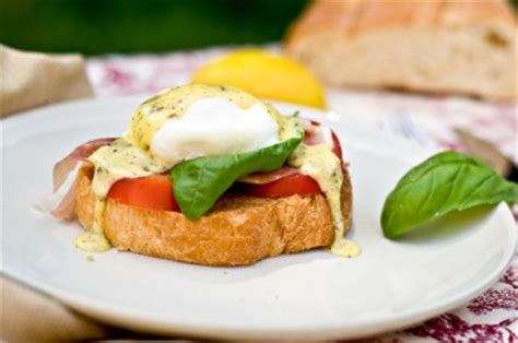 italian-eggs-benedict-with-pesto-hollandaise-tasty image