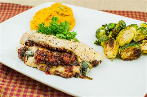chicken-stuffed-with-cheese-red-pepper-tapenade image